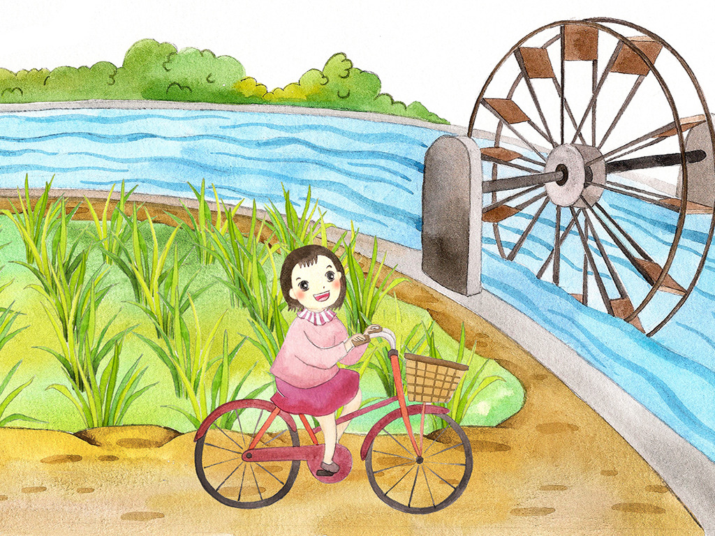 Mita騎著腳踏車參觀水圳